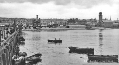 View from pier
A view from Helensburgh pier looking north to the outdoor swimming pool, the bandstand, and the Granary which was then a Wolseley garage. Image, circa 1930, supplied by Jim Chestnut.
