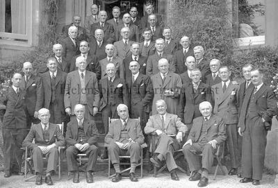 World War veterans
Helensburgh veterans of the First and Second World Wars pictured at a reunion at the Clydeview, East Montrose Street, home of Lieutenant Colonel Archibald MacConnell, DSO, TD (front row, centre), circa 1950. Soon after he donated his house to the Church of Scotland for use as an eventide home. Seated in the front row, second from the left, is World War One Battle of the Somme survivor Archibald Robertson, whose granddaughter Joan Spencer supplied this image. Third from the right in the standing front row is James Taylor, who owned the Music Shop in James Street, and second from the right is Walter S.Bryden, son of Provost Sam Bryden and owner of Macneur & Bryden Ltd. and the Helensburgh and Gareloch Times. Thomas Garrity DCM, an accomplished drummer who taught many aspiring local drummers, is seated front far left.
