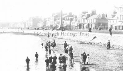 West seafront
Looking west from the pier, with some youngsters paddling. Date unknown.
