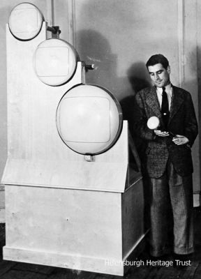 William Taynton
William Taynton is seen with large cathode ray tubes at Radiolympia in 1939.
