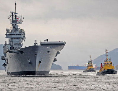 Ark Royal's Farewell
The 25 year-old aircraft carrier HMS Ark Royal, the Royal Navy flagship, leaves Loch Long for the final time on Wednesday November 17 2010 after spending four days moored at the Glenmallon jetty for her ammunition to be removed, following the Government decision to decommission the 22,000 ton vessel. Photo: Crown Copyright; image made available by courtesy of the Clyde Naval Base, Faslane.
