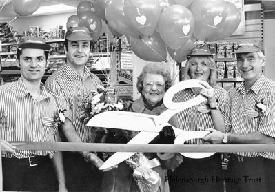 Wonder of Woolies-2
Local historian Pat Drayton is seen with members of staff inside the Woolworths store in West Clyde Street, Helensburgh, in October 1997. She won a competition to perform the official opening of a new look store after extensive refurbishment and was treated to a champagne breakfast before the opening. The store was open for many years until it closed in January 2009 when the chain went into administration.

